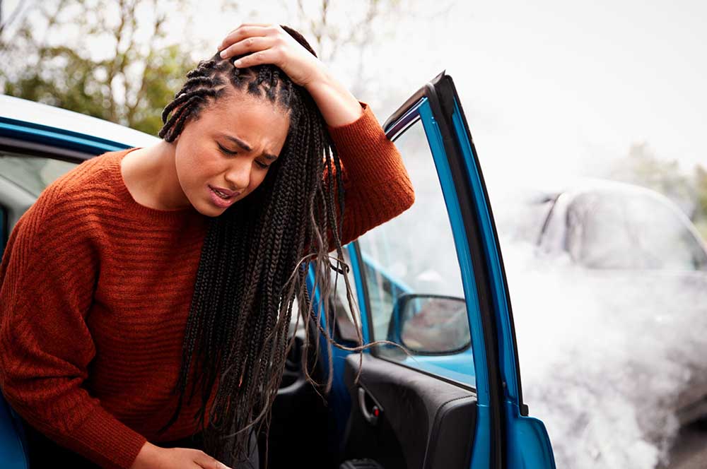 woman-exits-car-after-car-accident-in-Granite-Bay