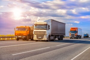 commercial trucks drive on sacramento highway