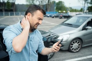 man with neck pain after car accident